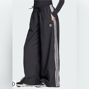 Adidas oversized Black Track Pants with White Stripes